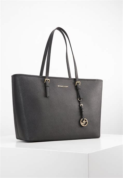 michael michael kors jet set travel handbag black|Michael Kors jet set item.